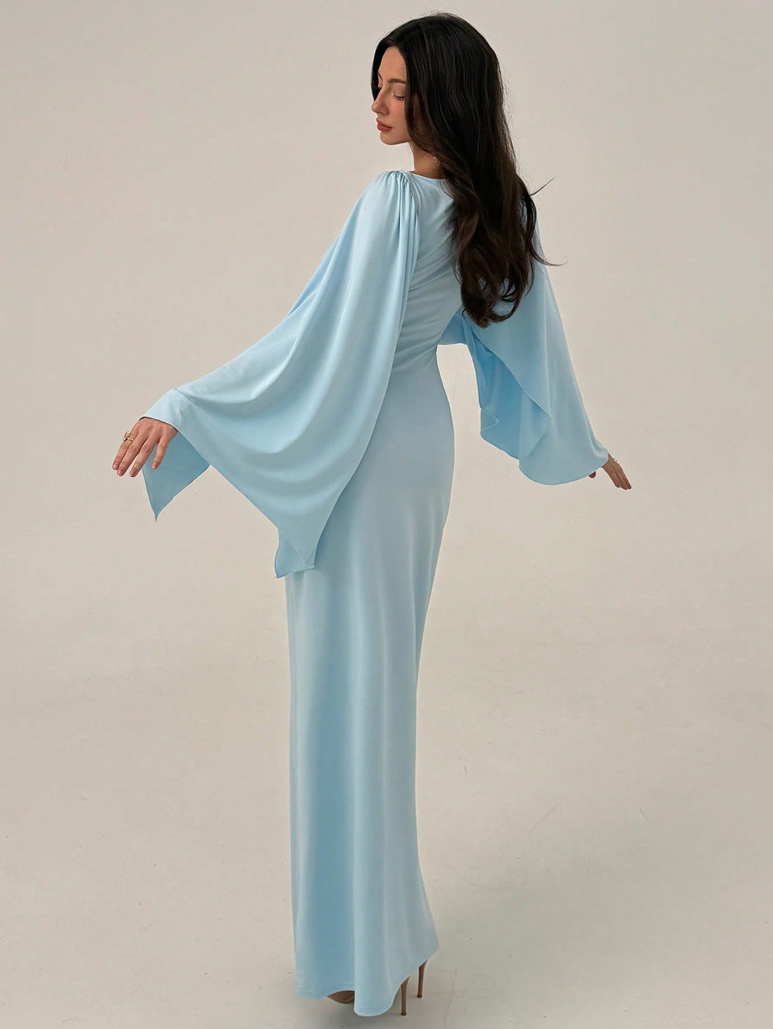 Make a statement at your next event in this sophisticated blue A-line party dress. Featuring eye-catching ruffled shoulders that add dimension and movement, this gown combines timeless elegance with contemporary flair. The flattering A-line silhouette skims the body gracefully, while the rich blue hue complements a variety of skin tones. Perfect for weddings, nightclub outings, or any special occasion where you want to turn heads. Crafted for comfort and confidence, this dress transitions seamlessly from co