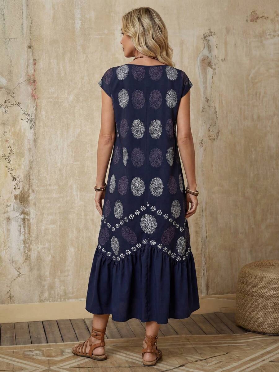 Navy floral print smock dress side view