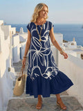 Navy floral border print dress lower hem detail