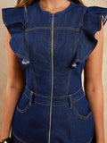 Close front detail of dark-indigo denim dress with ruffle shoulders exposed zipper belt loops and curved pockets