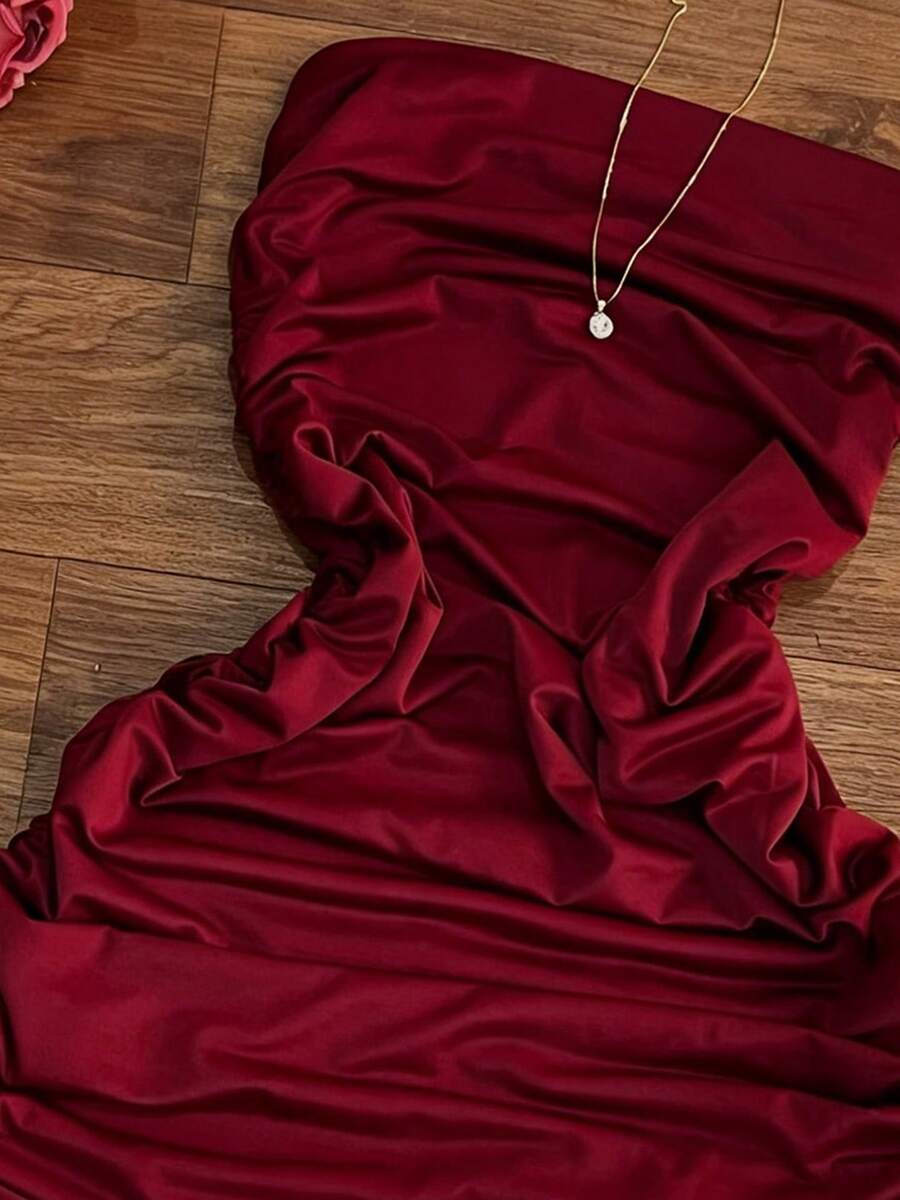 Turn heads this season in our Chic Asymmetric Hem Burgundy Bodycon Dress. This stunning piece features a flattering bodycon silhouette that hugs your curves in all the right places, paired with an eye-catching asymmetric hemline that adds modern edge and movement. Crafted for versatility, this burgundy beauty transitions seamlessly from summer cocktail parties to beachside getaways. 