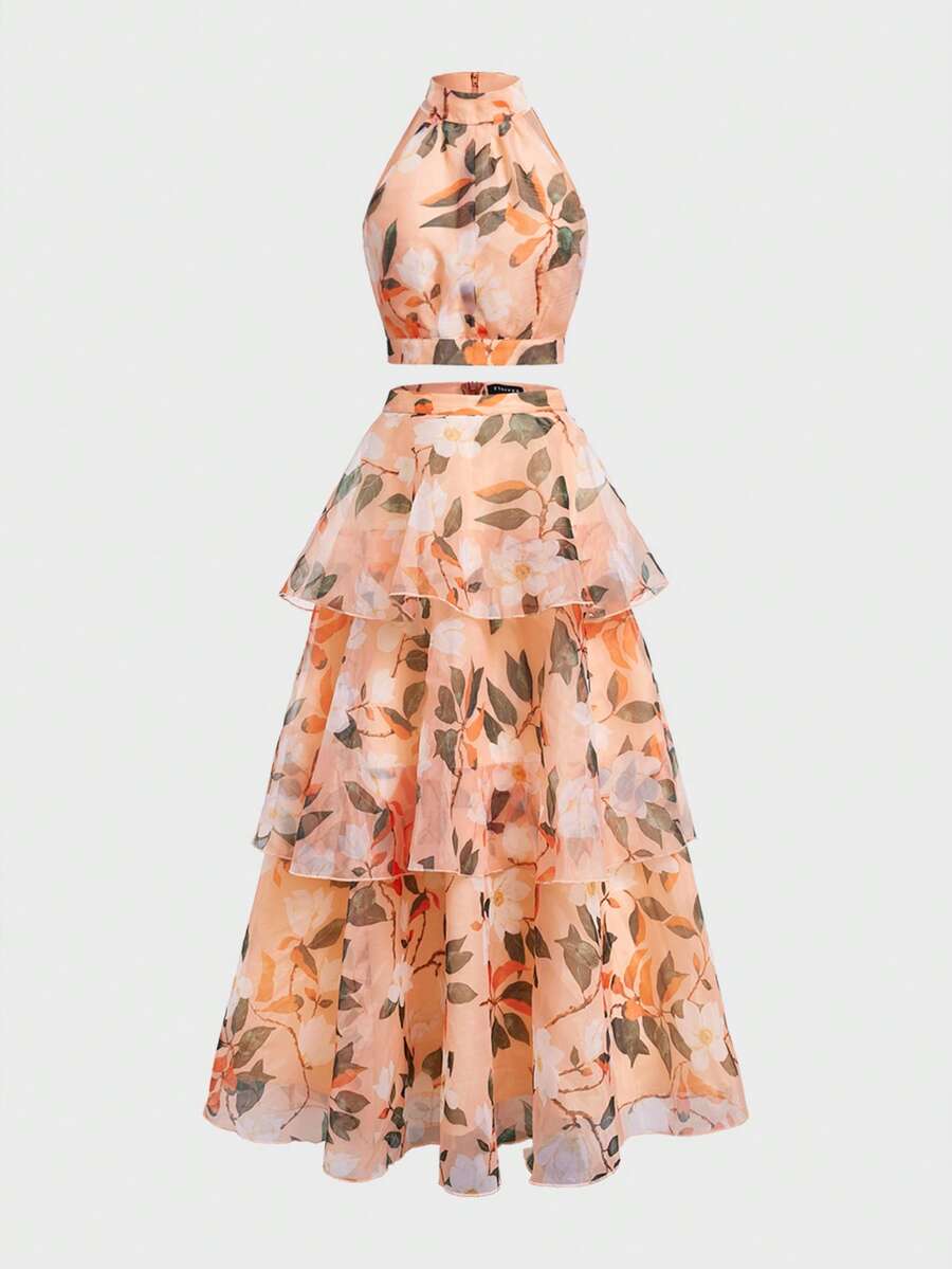 Front view of ivory floral halter crop top and long tiered skirt outfit