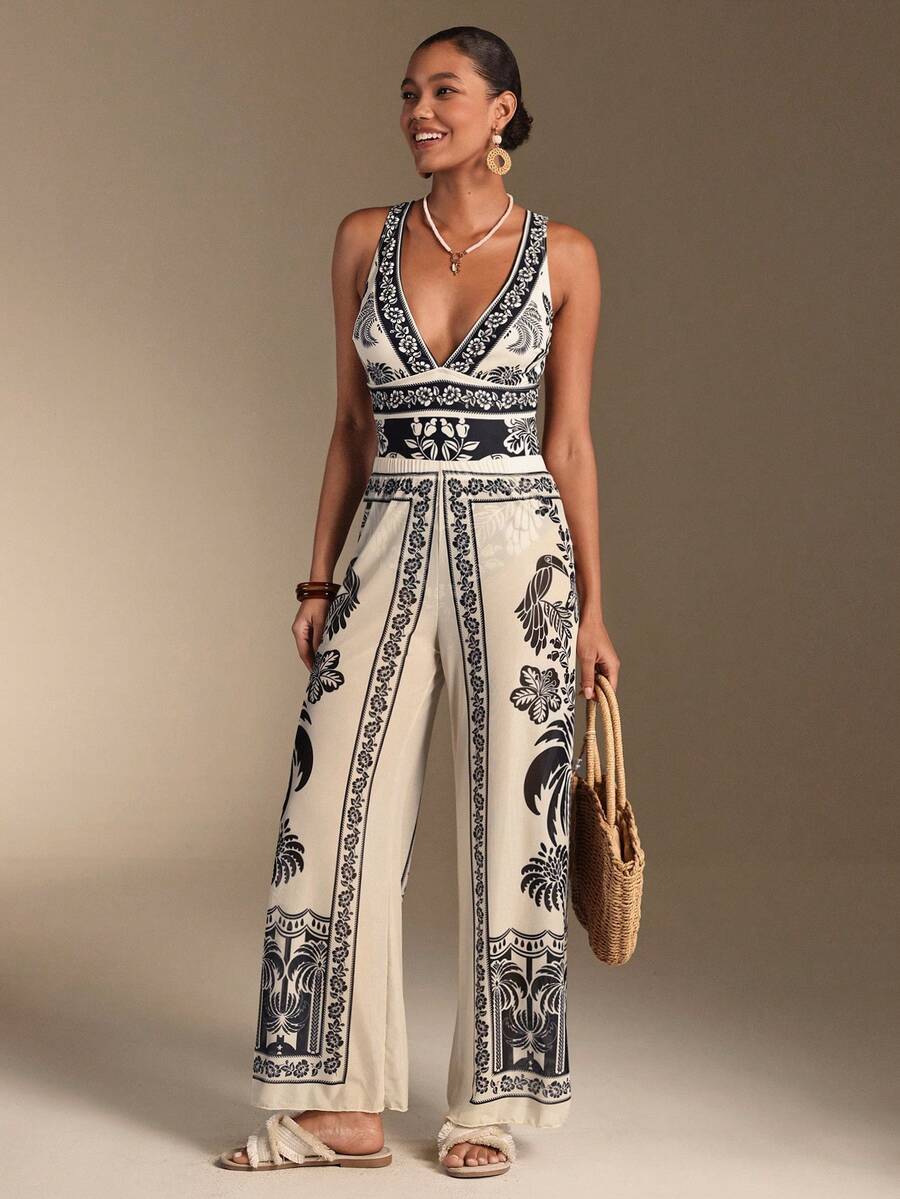 Embrace effortless coastal elegance with this stunning black and white seashell-inspired boho one-piece swimsuit paired with a matching skirt. The intricate seashell pattern brings a touch of oceanic charm, while the classic one-piece silhouette offers flattering coverage and timeless appeal. The coordinating skirt adds versatility—wear it poolside for a complete beach look or pair the swimsuit alone for swimming