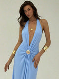 Close front view of light blue halter maxi dress with metallic shell waist accent