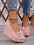 Elevate your spring wardrobe with these stunning pink wedge slip-ons, the perfect fusion of comfort and sophistication. The delicate bowknot accent adds a touch of feminine charm, while the slip-on design means you can slip them on and go. Built with premium suede leather uppers and a supportive PU leather lining, these court wedges deliver both durability and softness underfoot. The high wedge heel provides a graceful lift without sacrificing stability, making them ideal for work, weekend outings, or cozy 