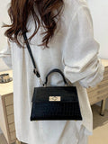 Image 17 - lifestyle view of Stylish Mini Polka Dot PU Leather Clutch Handbag for Fashion-Forward Looks