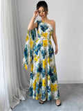 Print detail view of asymmetrical floral vacation dress