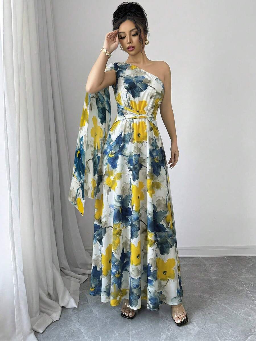 Print detail view of asymmetrical floral vacation dress