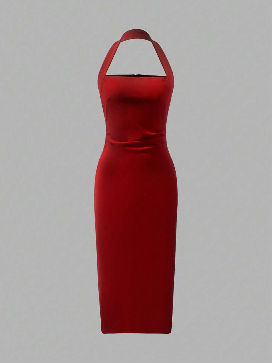 Back view red halter midi dress with center seam