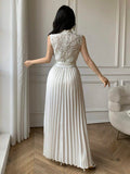 Styled view of lace bodice pleated maxi dress showing visible color, print, and silhouette