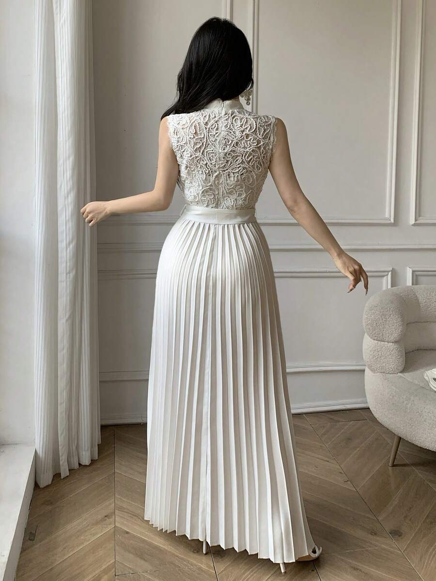 Styled view of lace bodice pleated maxi dress showing visible color, print, and silhouette