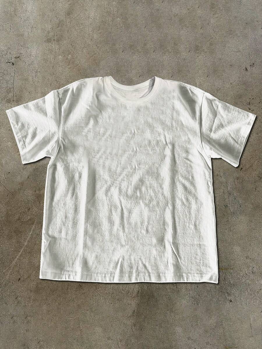 Front flat lay of plain white boxy short-sleeve crew-neck T-shirt
