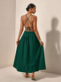 Back view green maxi dress with crisscross tie straps and open back