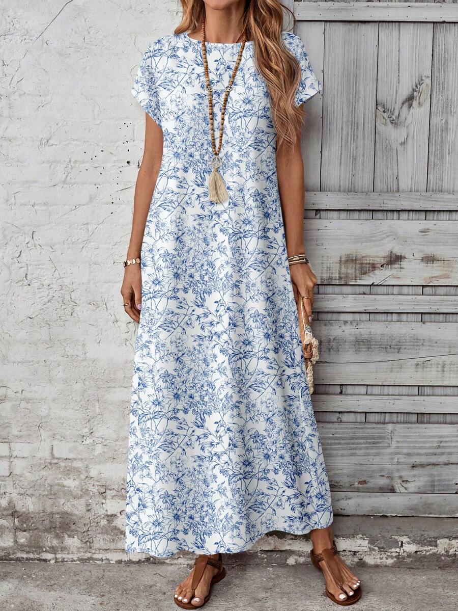 Back view of lavender floral loose maxi dress with dense allover print
