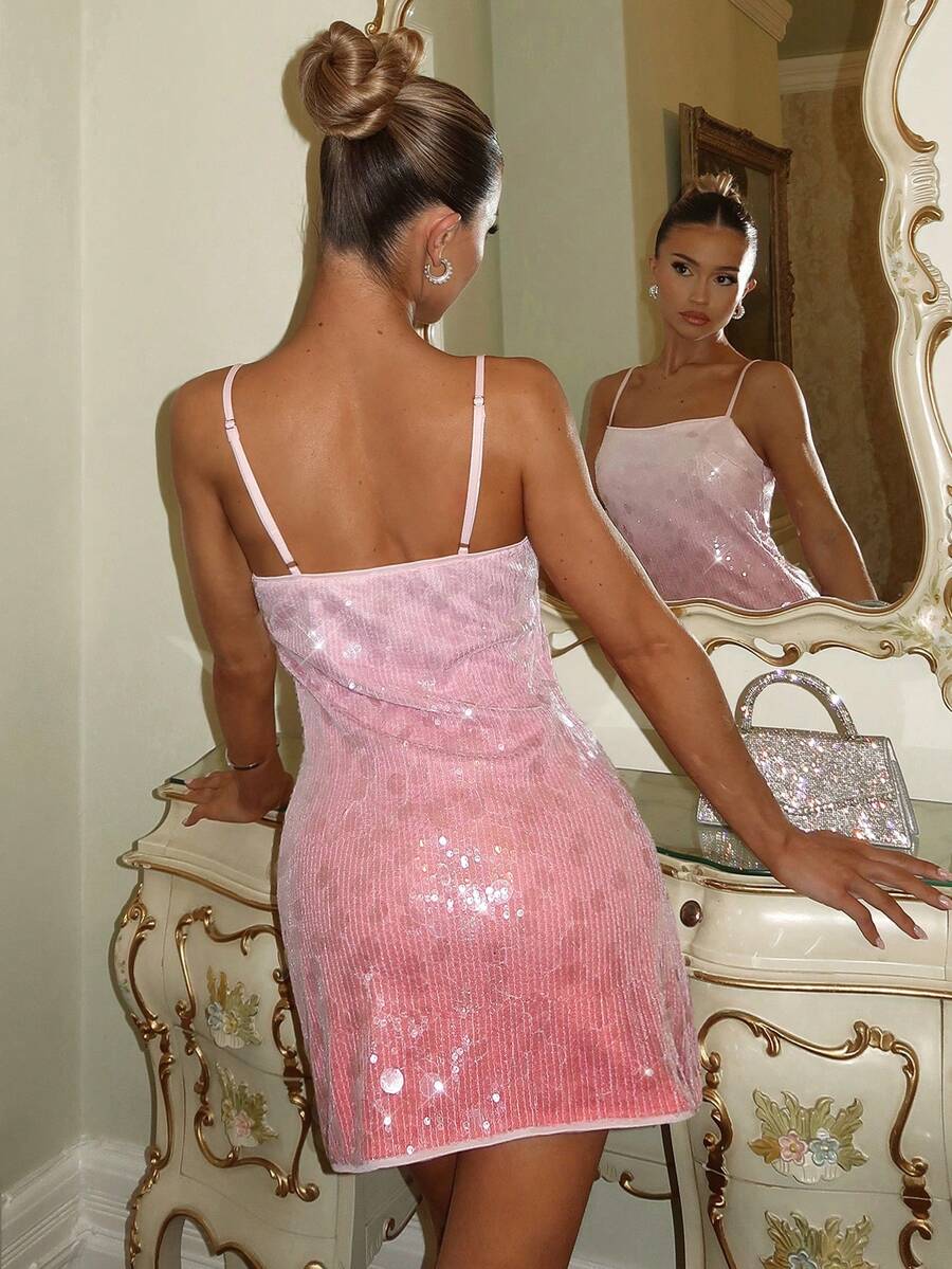 Turn heads in this ombre peach pink sequin mini dress, designed to bring glamour and confidence to every special occasion. Featuring delicate spaghetti straps, shimmering allover sequins, and a flattering mini-length silhouette, this dress creates a dazzling look that catches the light from every angle.