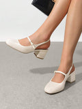 low chunky heel Mary Jane pumps image 3 showing visible heel, strap, toe, color, and material details