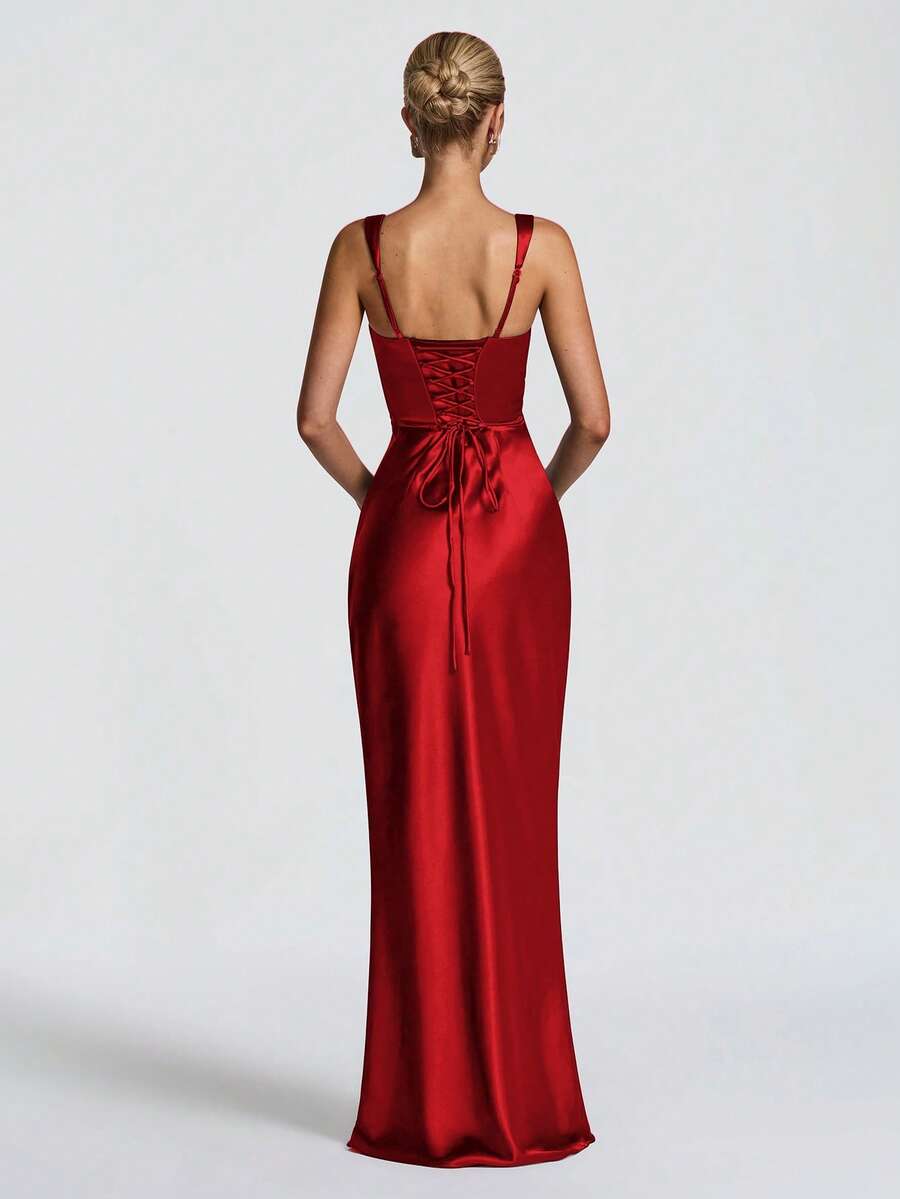 Front full-length view of plum satin mermaid gown with square neckline and sleeveless straps