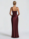 Rear view of burgundy satin gown showing lace-up back panel and long fitted mermaid skirt