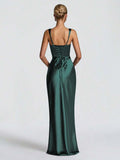 Front full-length view of burgundy ruched satin gown styled with long gloves