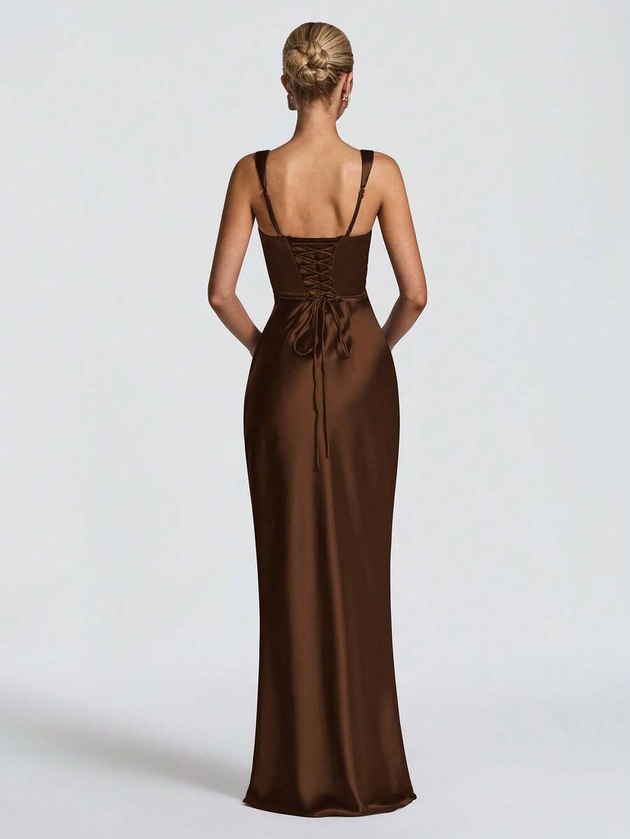 Rear full-length view of brown satin gown with lace-up back detail and slim straps