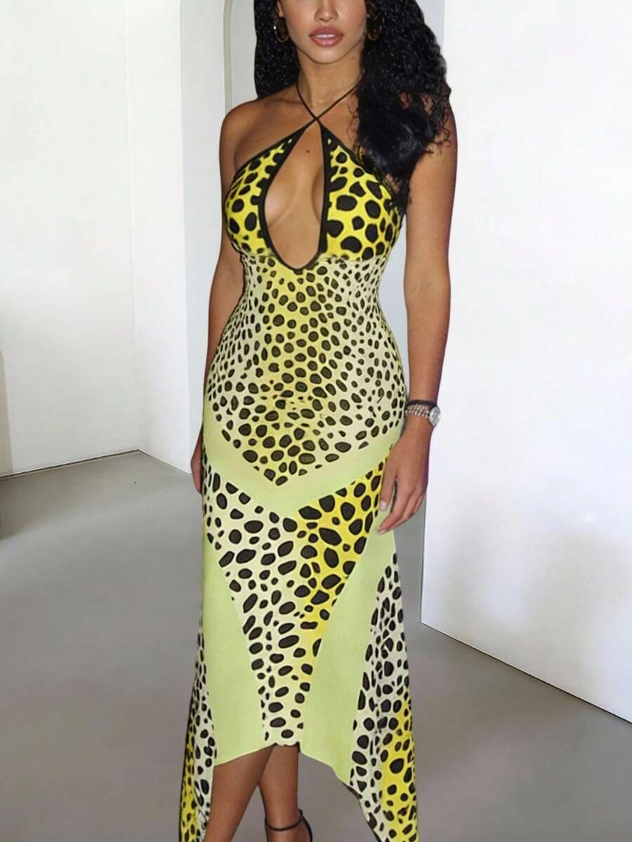 Front view of yellow leopard print halter maxi dress showing fitted long silhouette