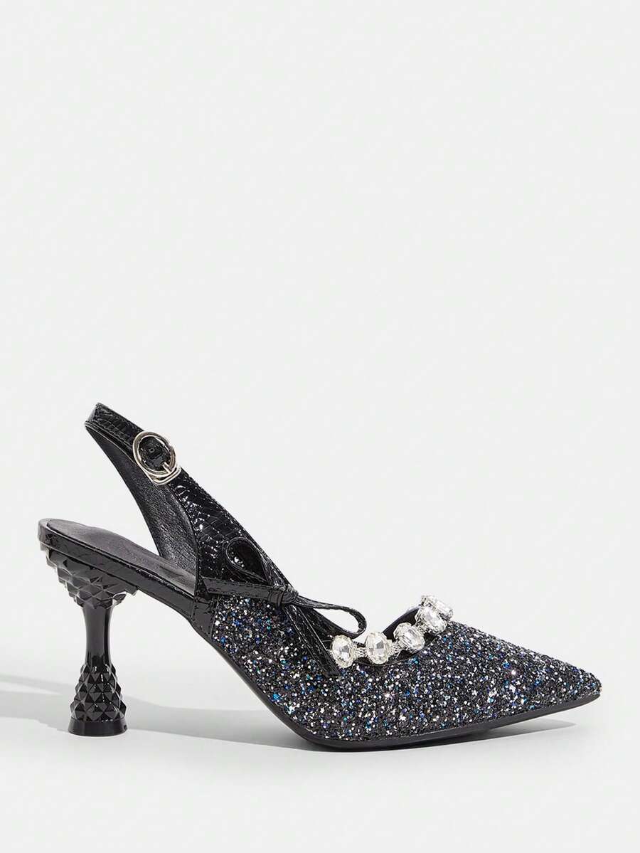 Elevate your seasonal wardrobe with these glittering bowknot high heels, a breathtaking fusion of high-octane glamour and sophisticated edge. Designed for the transitional beauty of spring and autumn, these heels feature a dazzling shimmering finish and an oversized signature bow that captures the light with every step. The addition of a chic metallic chain strap provides both a secure, adjustable fit and a modern, jewelry-inspired aesthetic that wraps elegantly around the ankle. Crafted with a cushioned in