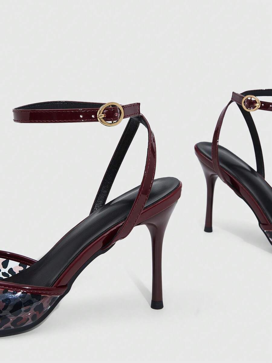 Elevate your Valentine's Day look with these striking leopard print stiletto heels. Featuring an open toe design and sleek stiletto heel, they deliver timeless sophistication with a bold animal print twist. The classic silhouette pairs effortlessly with dresses, skirts, or tailored trousers for an instantly polished appearance. Crafted for the modern woman who appreciates statement footwear, these heels transition seamlessly from evening events to upscale occasions. The precise heel height provides elegant 