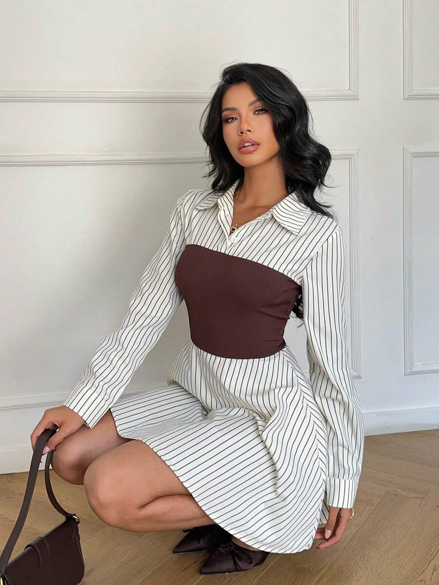 White pinstripe collared mini shirt dress with brown bodice panel seated front view