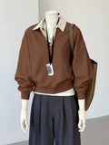 Close-up detail of Women's Striped Long Sleeve Sweatshirt with Classic Shirt Collar striped fabric texture