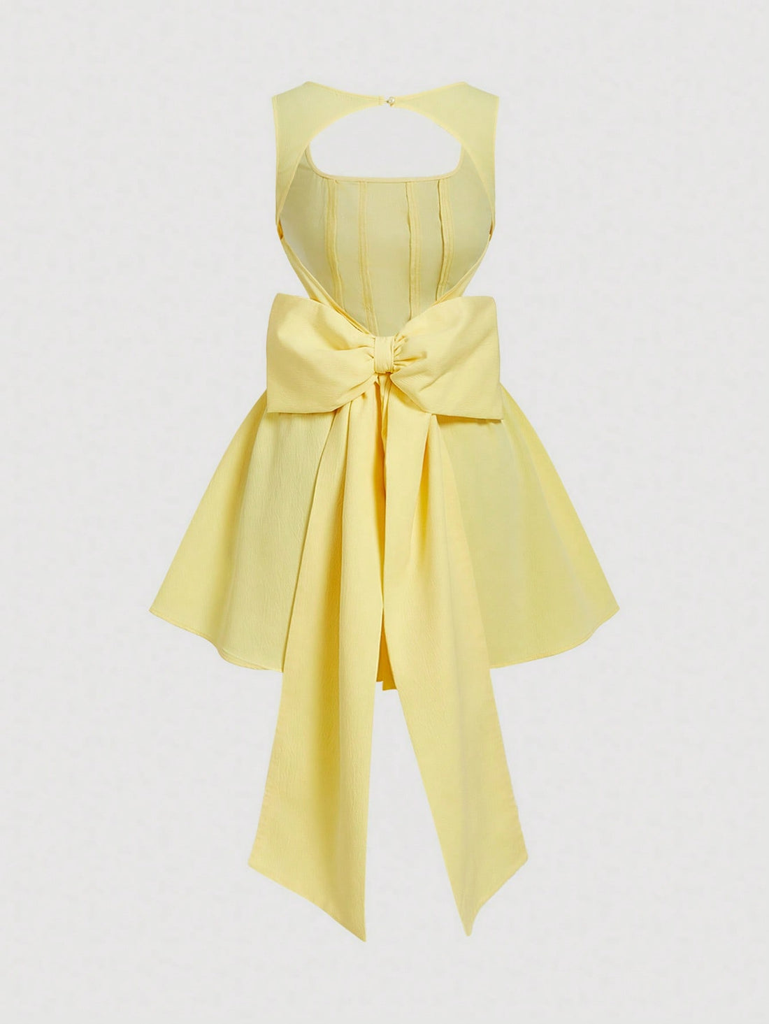 Turn heads this season in our stunning yellow backless dress, designed for those who embrace effortless elegance. The striking large bow detail adds a touch of sophistication while the open back creates a flattering, modern silhouette. Crafted for versatility, this dress transitions seamlessly from vacation getaways to intimate dinner dates and summer celebrations. The vibrant yellow hue radiates warmth and confidence, making it an instant favorite for any occasion that calls for standout style. Whether you