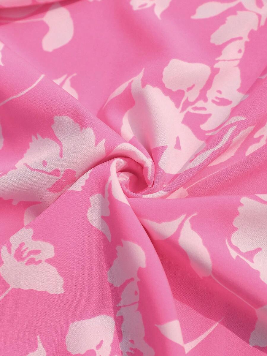 Embrace effortless elegance with this stunning pink floral maxi dress, perfect for summer getaways and special occasions. Featuring a flattering high-waist silhouette, sleeveless cold-shoulder design, and a thigh-high slit, this boho-inspired piece combines comfort with style. The halter neckline and backless detail create a chic, vacation-ready look, while the A-line cut ensures a graceful drape. Crafted from a breathable polyester-elastane blend with a knot detail at the waist, this unlined dress transiti