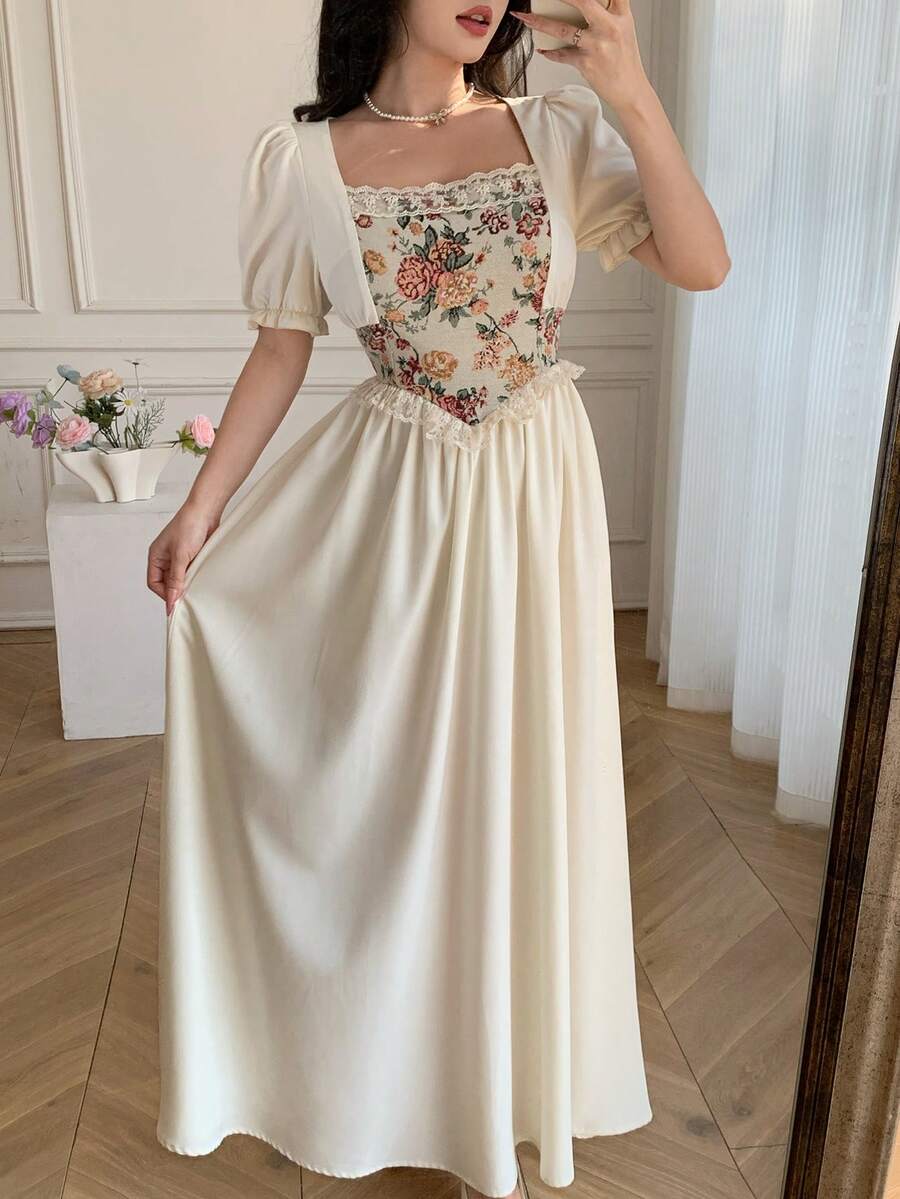 Close detail view of vintage floral tapestry bodice puff sleeve maxi dress showing visible color, print, and silhouette