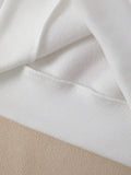 Close-up of soft fuzzy hoodie interior and ribbed bottom hem stitching