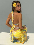 Yellow halter maxi dress with side ruffle drapes