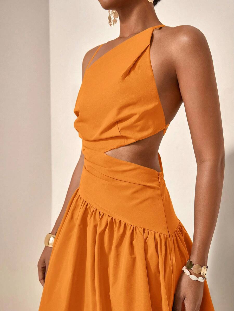 Close-up orange one-shoulder maxi dress with waist cutout