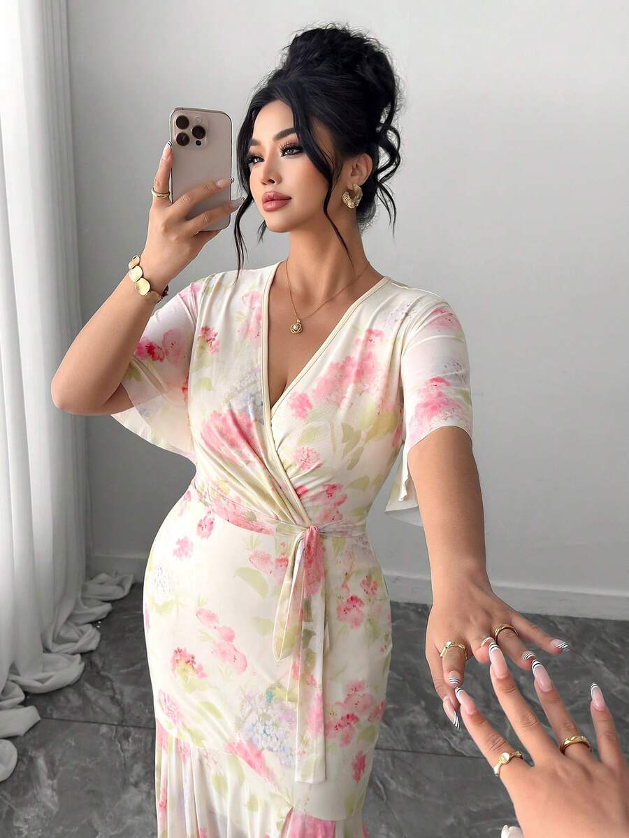 Front view of ivory pink floral V-neck tie-waist mermaid maxi dress