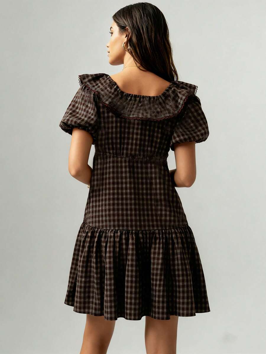 Front view of coffee plaid mini dress with ruffle collar and puff sleeves