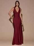 Back view of burgundy sleeveless deep V-neck maxi dress with crossed open back, shown for wedding and evening wear
