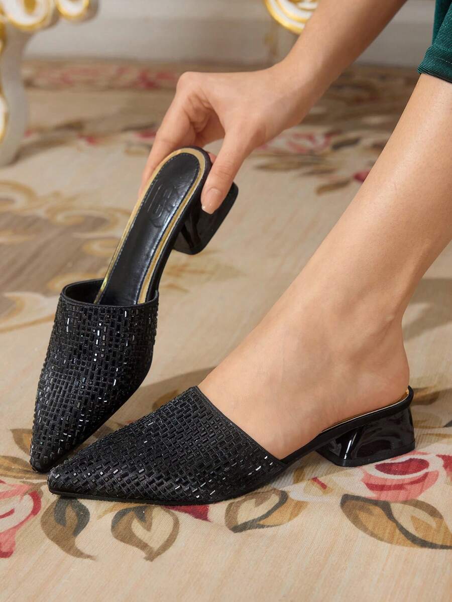 Elevate your everyday wardrobe with these sophisticated rhinestone-adorned pumps, designed for the modern woman who refuses to compromise on style. Featuring meticulously placed rhinestone embellishments that catch the light with every step, these pumps transition seamlessly from office to evening events. The polished silhouette offers timeless elegance, while the comfortable heel height supports all-day wear without sacrificing grace. Perfect for professionals seeking a refined accessory that commands atte