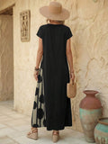 Back view of black loose maxi dress with solid back and long straight hem