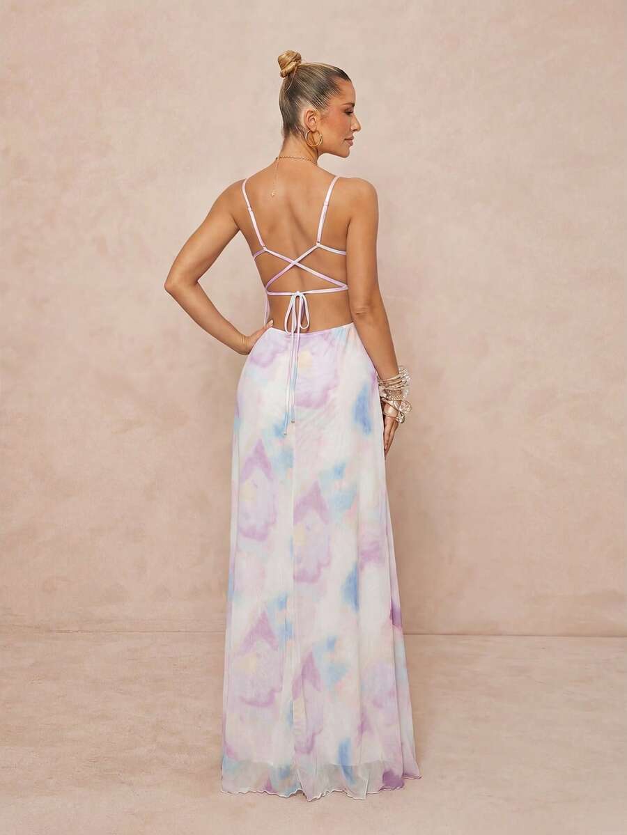 Elevate your vacation wardrobe with this stunning iridescent pleated waist goddess dress. Featuring a deep V-neckline, criss-cross lace-up back, and flattering A-line silhouette, this sleeveless maxi dress combines elegance with allure. The high-waisted design and mermaid hem create a sophisticated, elongating effect perfect for beach getaways and formal occasions. Crafted from a breathable polyester-elastane blend with medium stretch, the lined construction ensures comfort and confidence. Available in rich