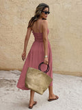 Back view pink ruched bust midi sundress with smocked back and adjustable straps