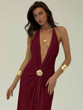 Close front view of burgundy deep V halter dress with metallic shell detail