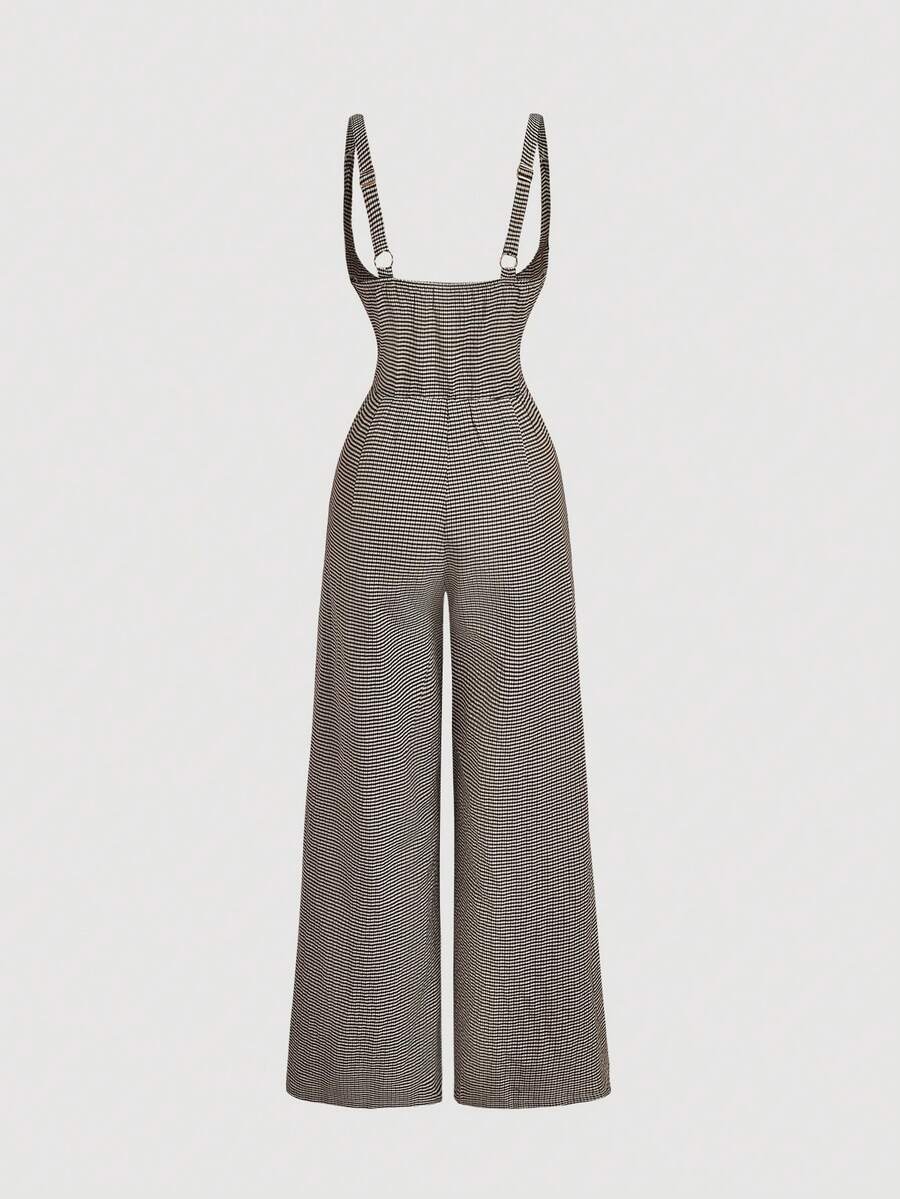 Model wearing coffee brown wide leg strap jumpsuit over a white blouse