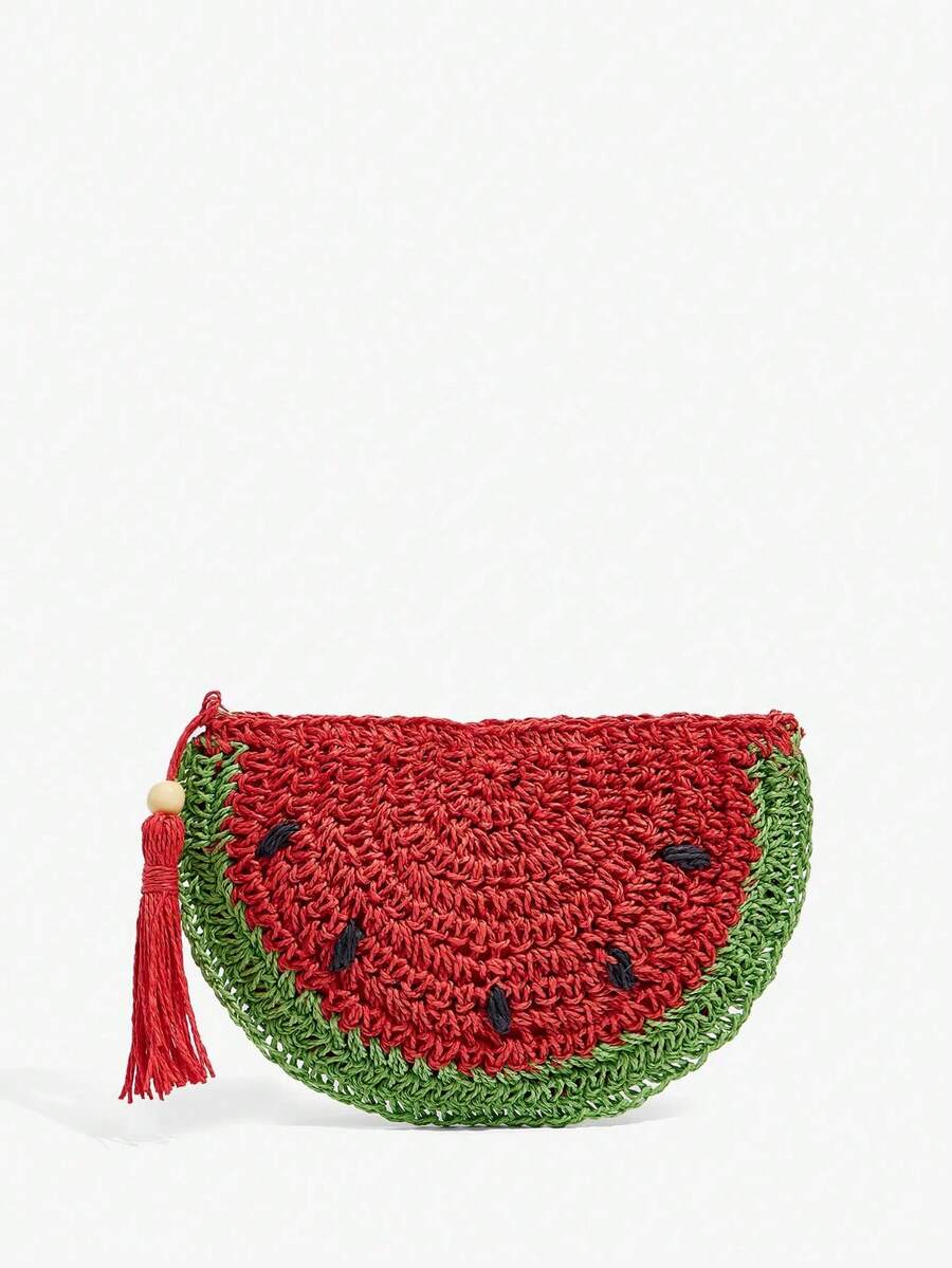 Fashion detail view of textured straw clutch with tassel