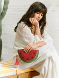 Close-up front view of fun fruit-themed clutch bag