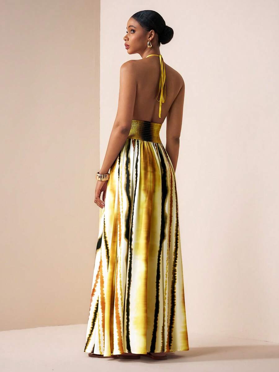 Capture the free-spirited essence of the season with this vibrant boho A-line maxi dress, a show-stopping piece designed for the energy of Spring 2026 festivals and sun-drenched celebrations. Featuring a daring deep V-neckline and a sultry backless design, this dress perfectly balances bold allure with a relaxed, flowing silhouette that moves gracefully with every step. The intricate patterns and rich colors evoke a vintage bohemian charm, while the high-quality, breathable fabric ensures you stay cool and 