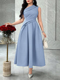 Front view of powder blue asymmetric ruched A-line midi dress in marble interior