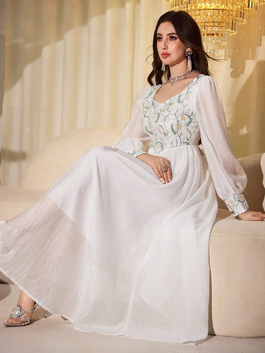 Experience the breathtaking fusion of artisanal botanical heritage and sharp, modern architectural tailoring. This stunning white embroidered dress is meticulously designed for the woman who values a high-fashion, "quiet luxury" approach to seasonal dressing—the ultimate centerpiece for prestigious garden weddings, exclusive coastal retreats, and high-authority spring and summer social gatherings