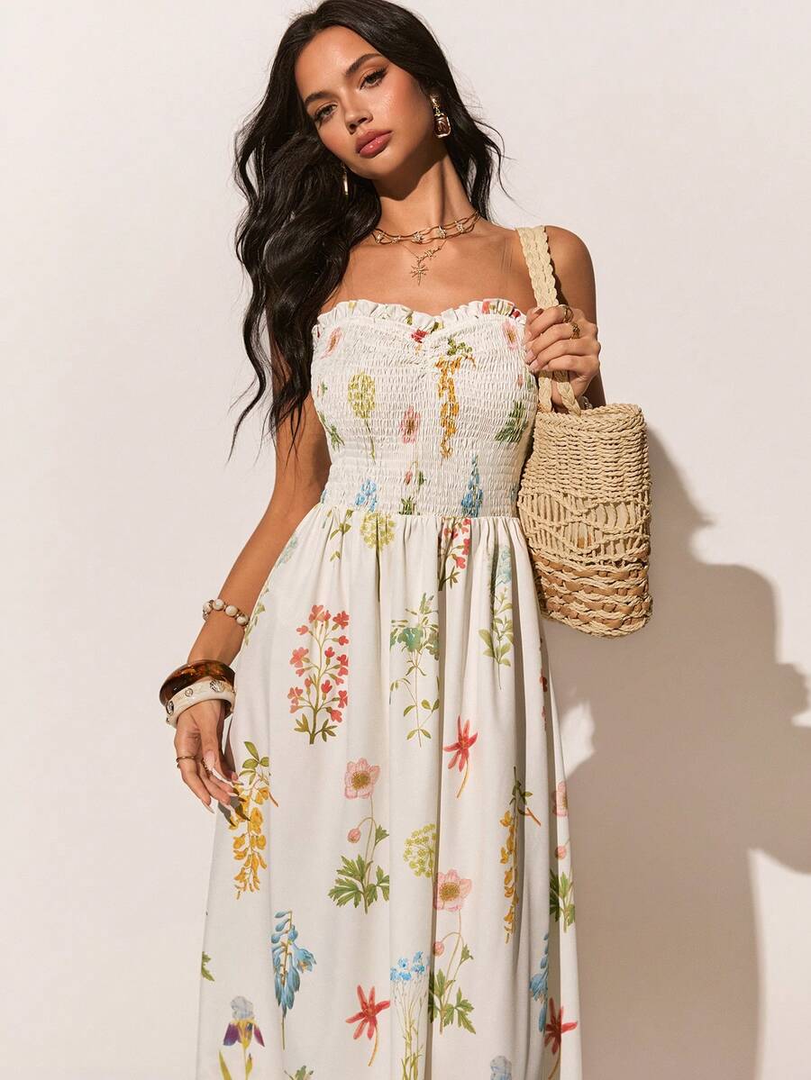 Experience the breathtaking fusion of botanical heritage and sharp, modern architectural tailoring. This stunning floral tube dress is meticulously designed for the woman who values a high-fashion, "quiet luxury" approach to seasonal dressing—the ultimate centerpiece for prestigious beach clubs, exclusive coastal retreats, and high-authority summer social gatherings.